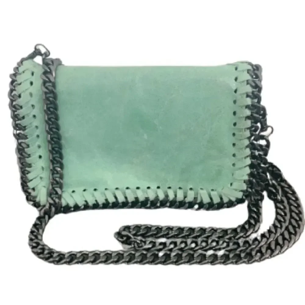 Borse In Pelle Stella Green Clutch & Crossbody Bag in Leather